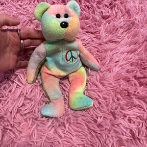 Gently used Peace Beanie Babie